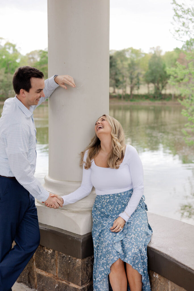 beautiful couple pose together during their Piedmont Park engagement photoshoot