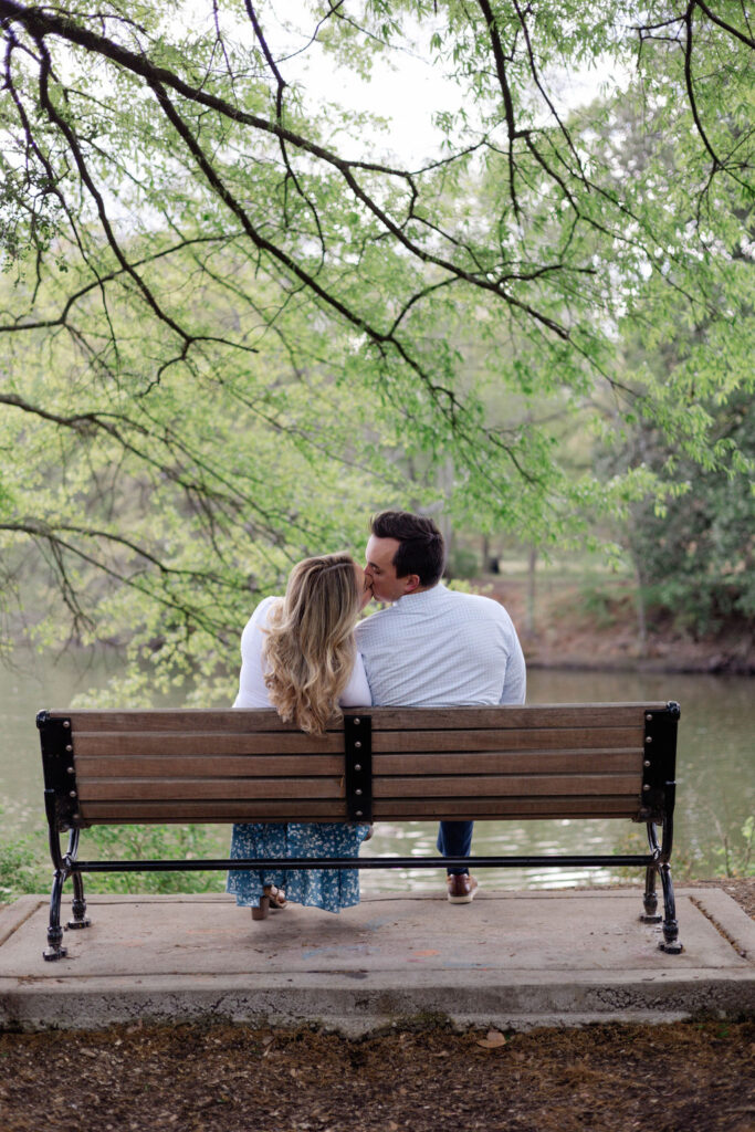 beautiful couple pose together during their Piedmont Park engagement photoshoot