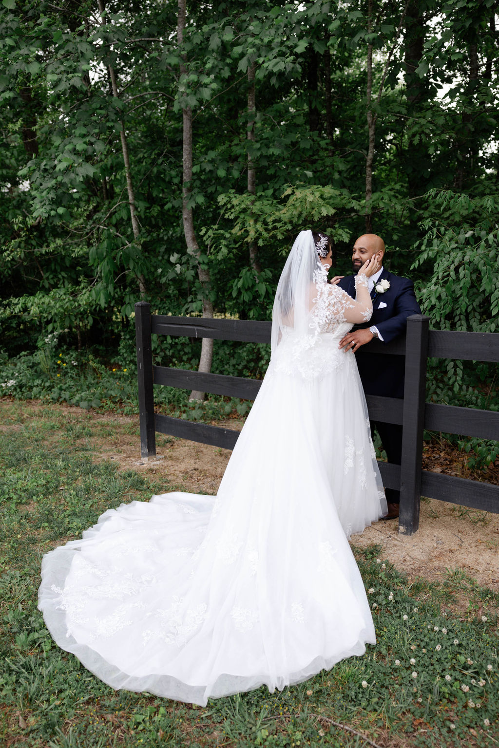 bride and groom pose around the stunning Georgia wedding venue