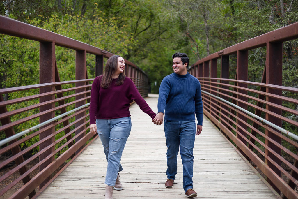 stunning couple pose at their Old Rope Mill Park engagement photoshoot