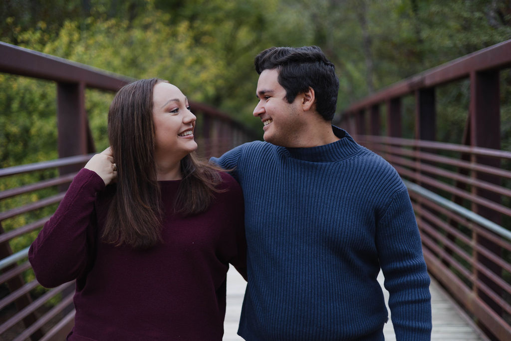 stunning couple pose at their Old Rope Mill Park engagement photoshoot