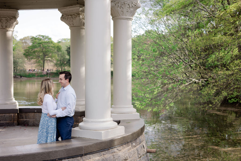 stunning couple pose together during their Atlanta engagement photoshoot