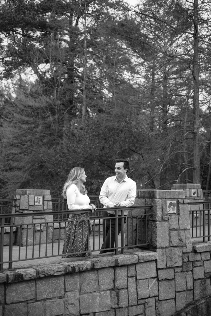 stunning couple pose together during their Atlanta engagement photoshoot