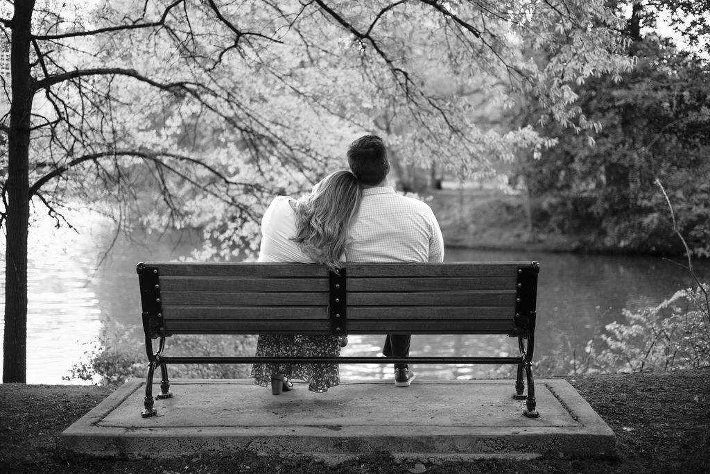 stunning couple pose together during their Atlanta engagement photoshoot