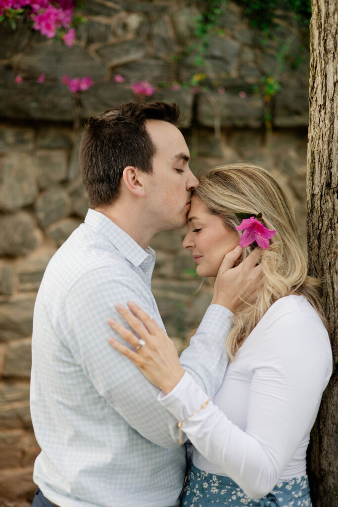 stunning couple pose together during their Atlanta engagement photoshoot