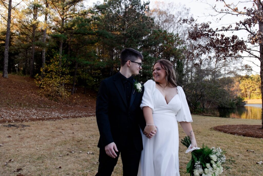 stunning bride and groom pose together after their stunning wedding day