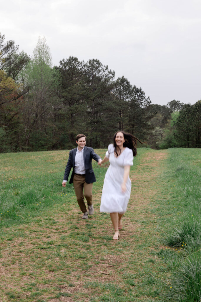 beautiful couple pose together during their Green Meadow Preserve engagement 