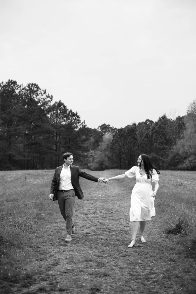 beautiful couple pose together during their Green Meadow Preserve engagement 