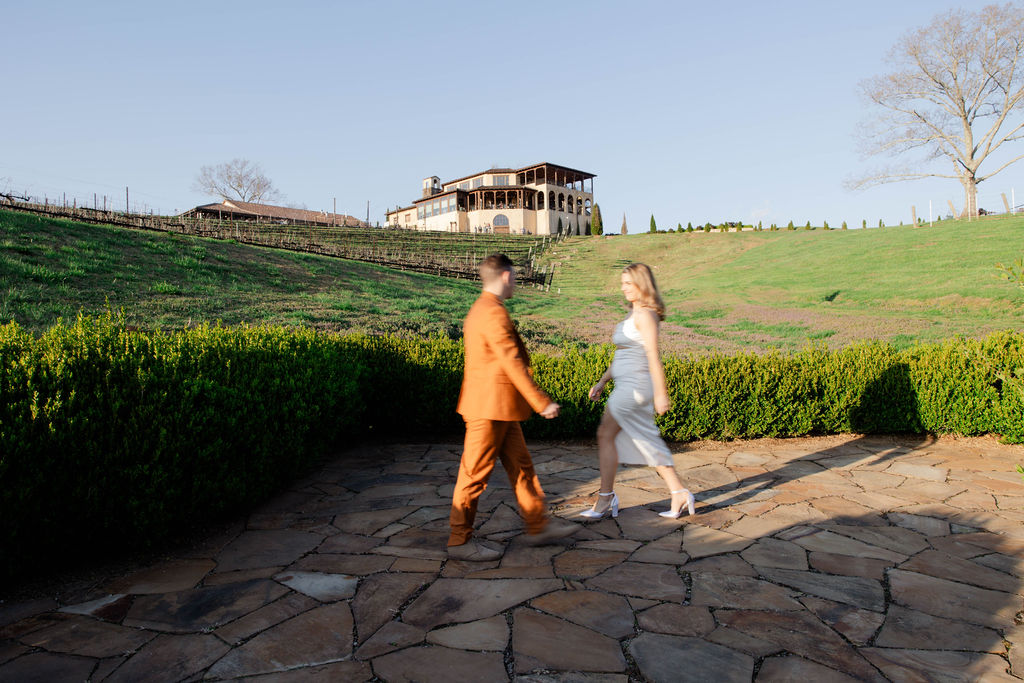 beautiful couple pose together during their Monteluce Winery engagement photos