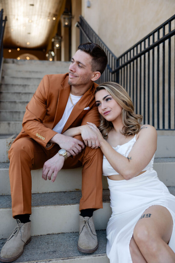 beautiful couple pose together during their Monteluce Winery engagement photos