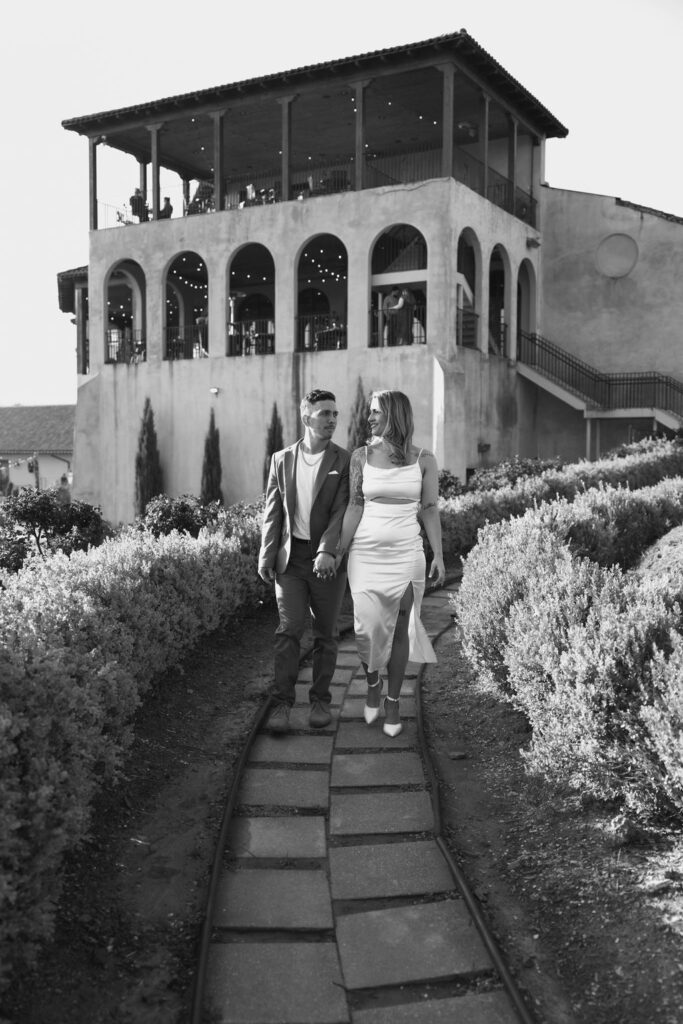 beautiful couple pose together during their Monteluce Winery engagement photos