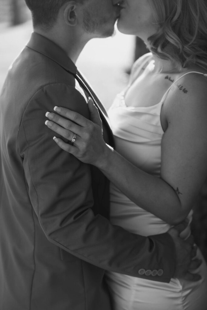 beautiful couple pose together during their Monteluce Winery engagement photos