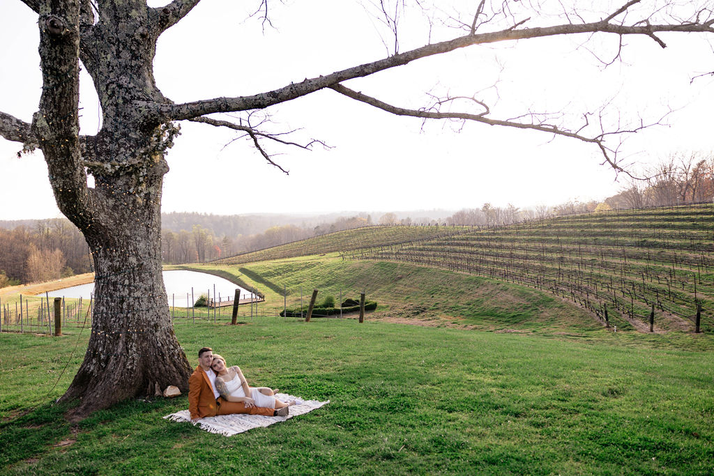 beautiful couple pose together during their Monteluce Winery engagement photos