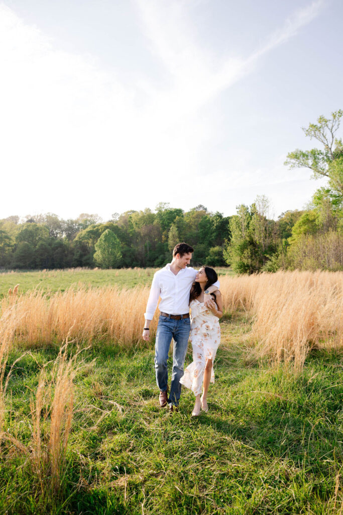 beautiful couple pose together at Arabia Mountain during their Georgia engagement photos