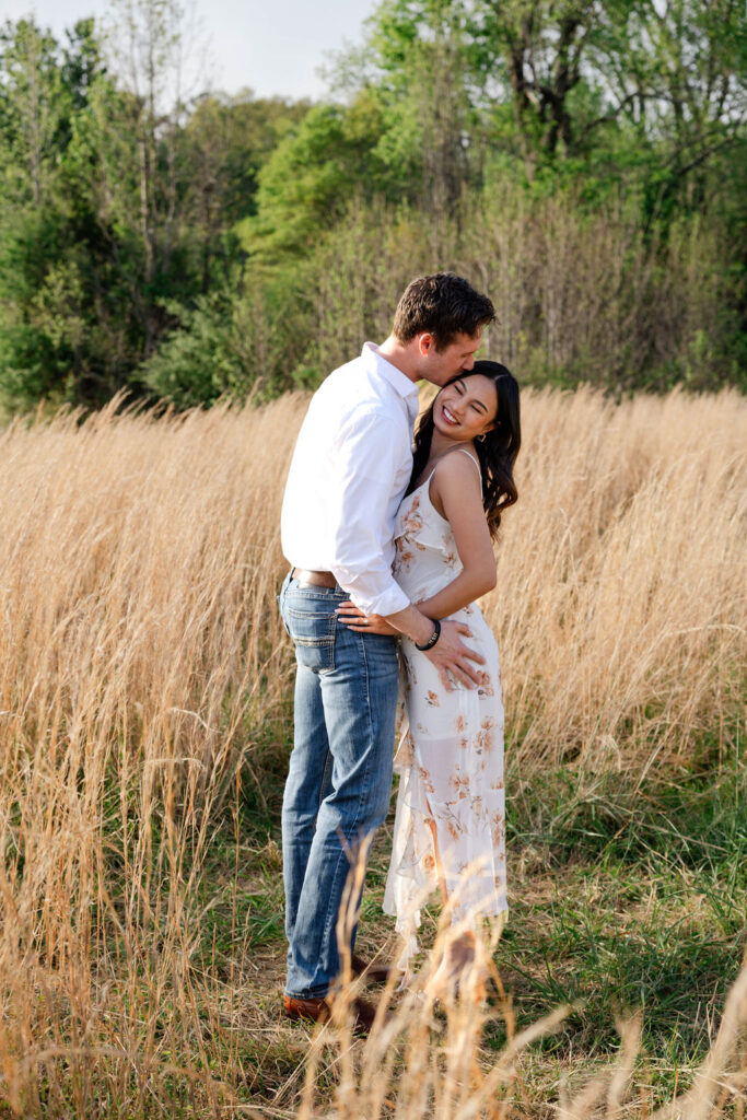 beautiful couple pose together at Arabia Mountain during their Georgia engagement photos