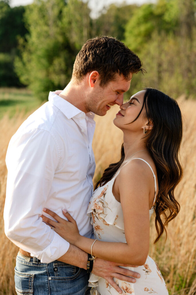 beautiful couple pose together at Arabia Mountain during their Georgia engagement photos