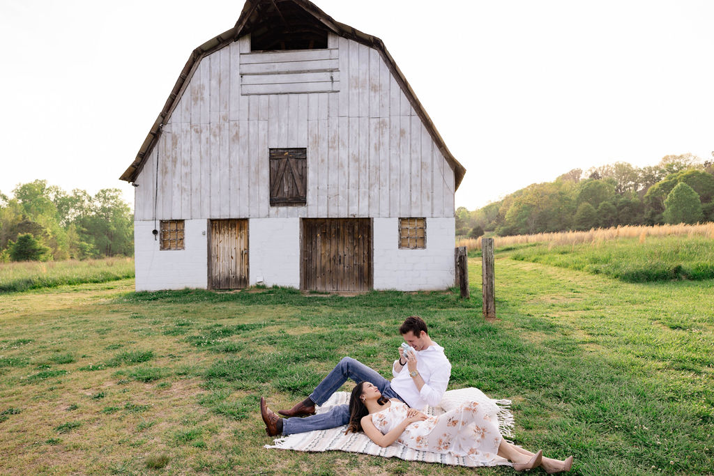 beautiful couple pose together at Arabia Mountain during their Georgia engagement photos