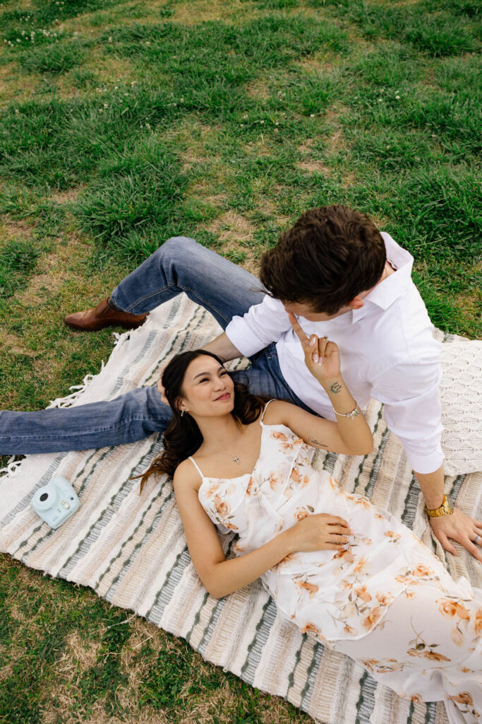 beautiful couple pose together at Arabia Mountain during their Georgia engagement photos