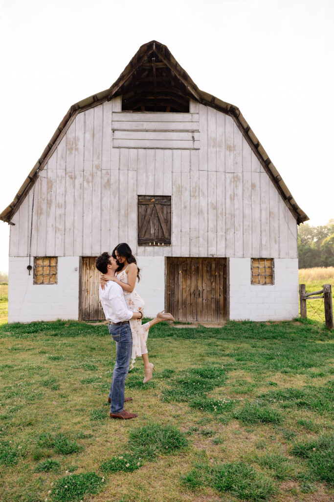 beautiful couple pose together at Arabia Mountain during their Georgia engagement photos