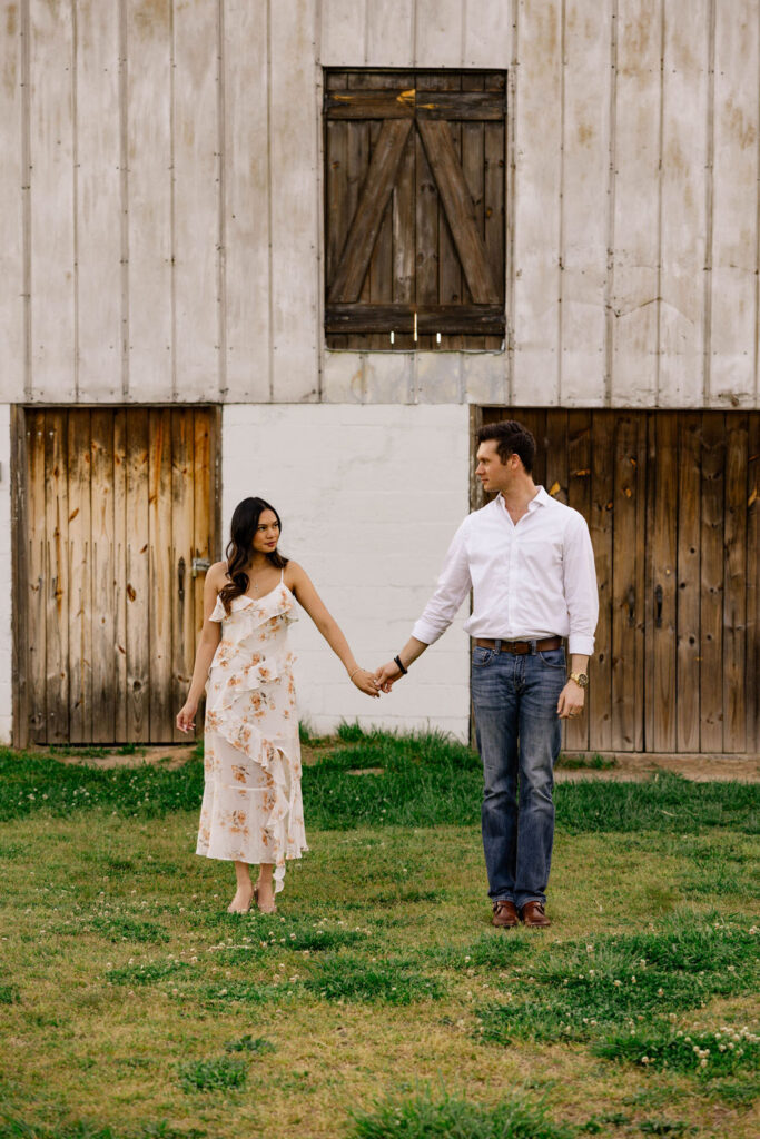 beautiful couple pose together at Arabia Mountain during their Georgia engagement photos