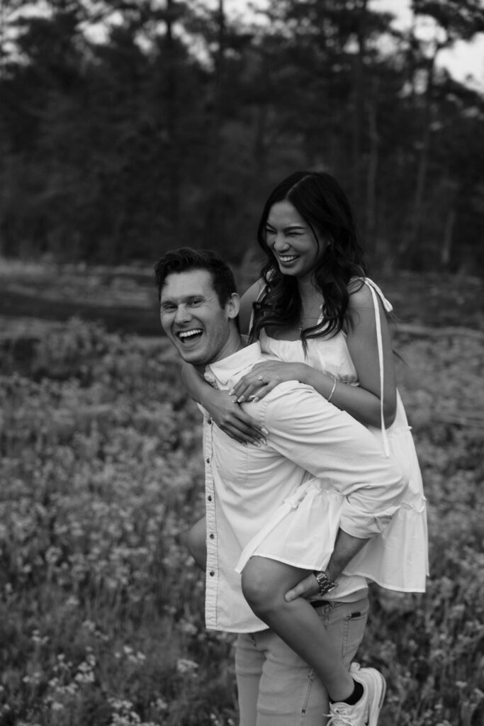 beautiful couple pose together at Arabia Mountain during their Georgia engagement photos