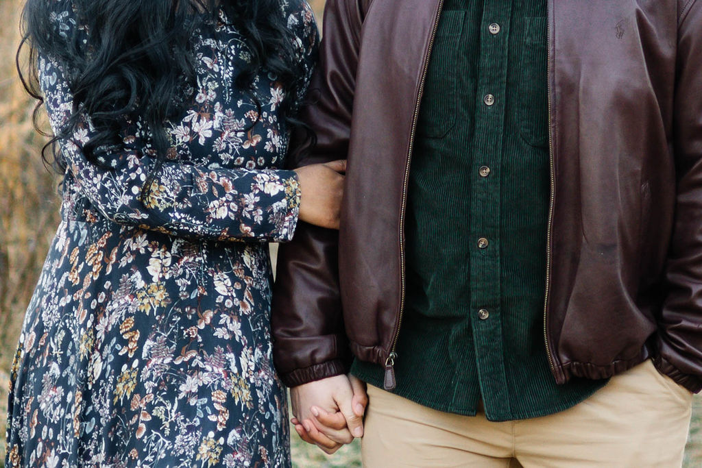 beautiful couple pose together during their Green Meadow Preserve engagement 