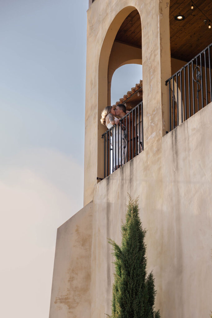 beautiful couple pose together during their Monteluce Winery engagement photos