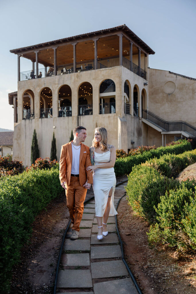 beautiful couple pose together during their Monteluce Winery engagement photos