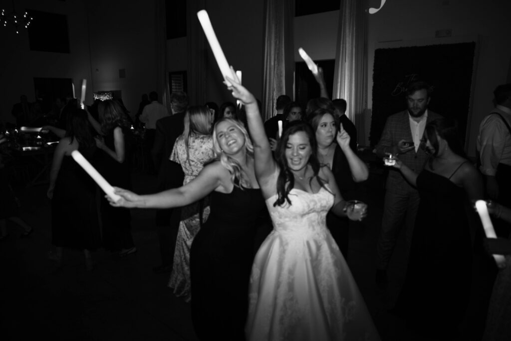 candid photos from a fun and exciting Georgia wedding reception at Barn South