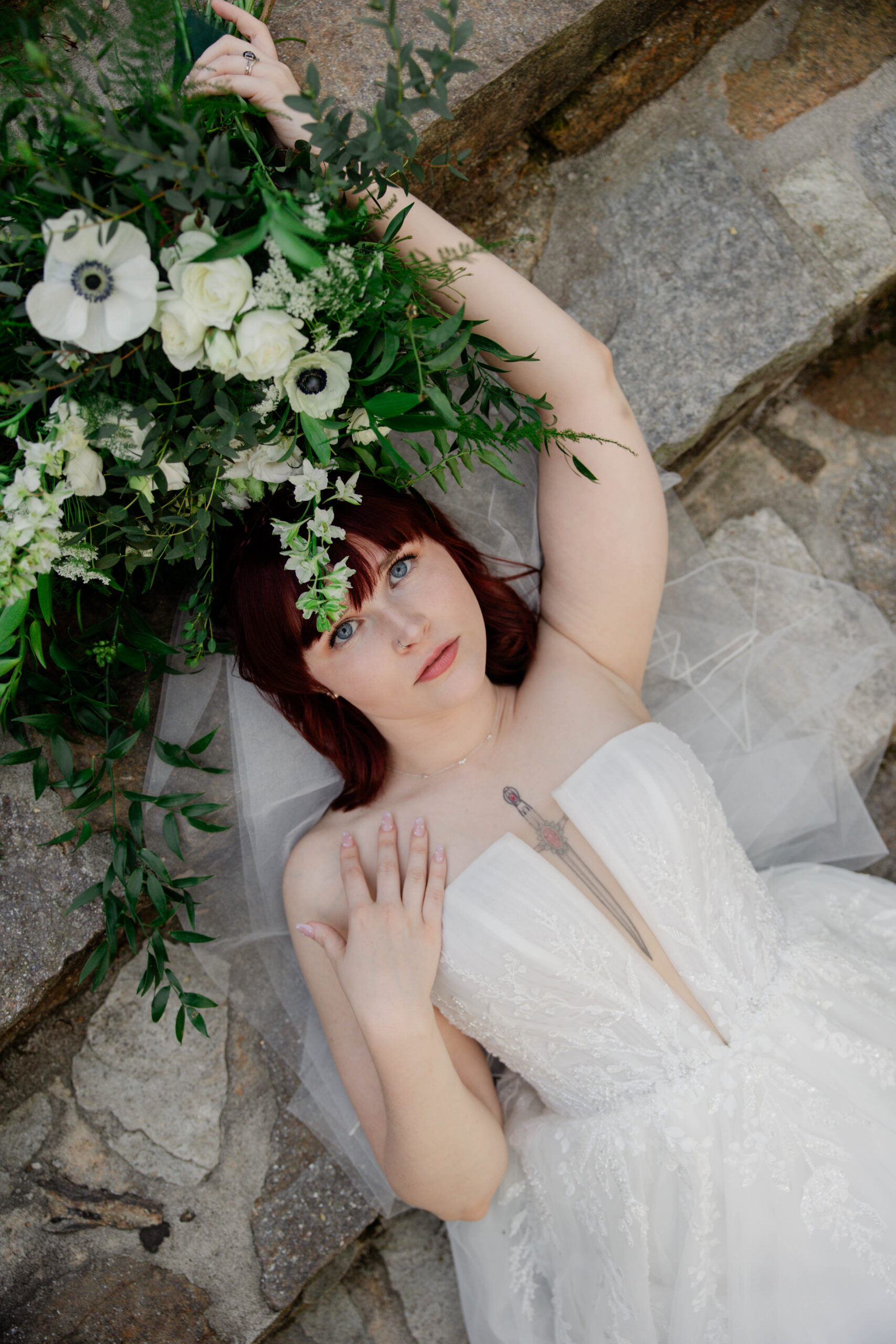 bride poses with her bouquet on her beautiful Georgia wedding day 