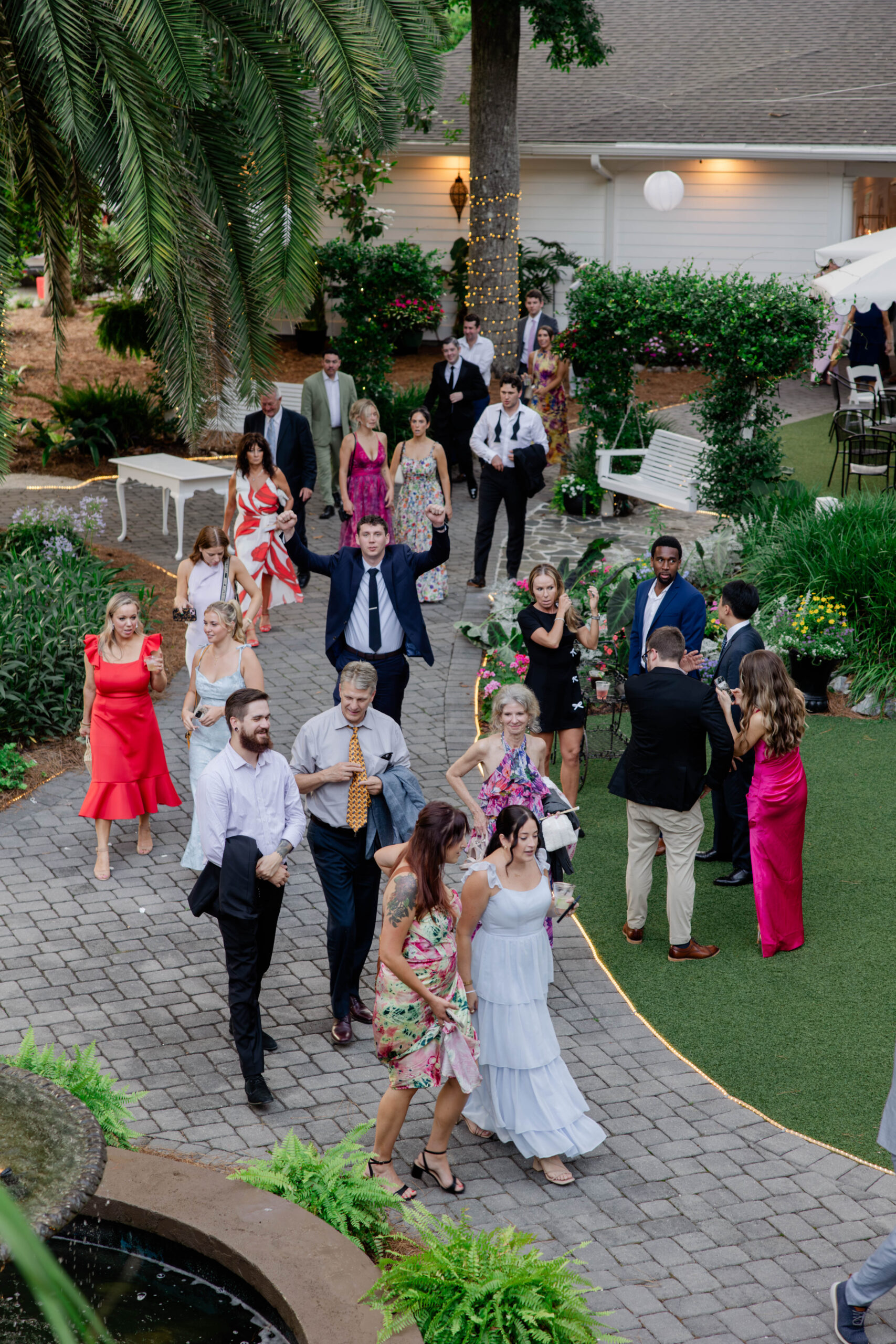 guests funnel into the wedding reception ready to party!