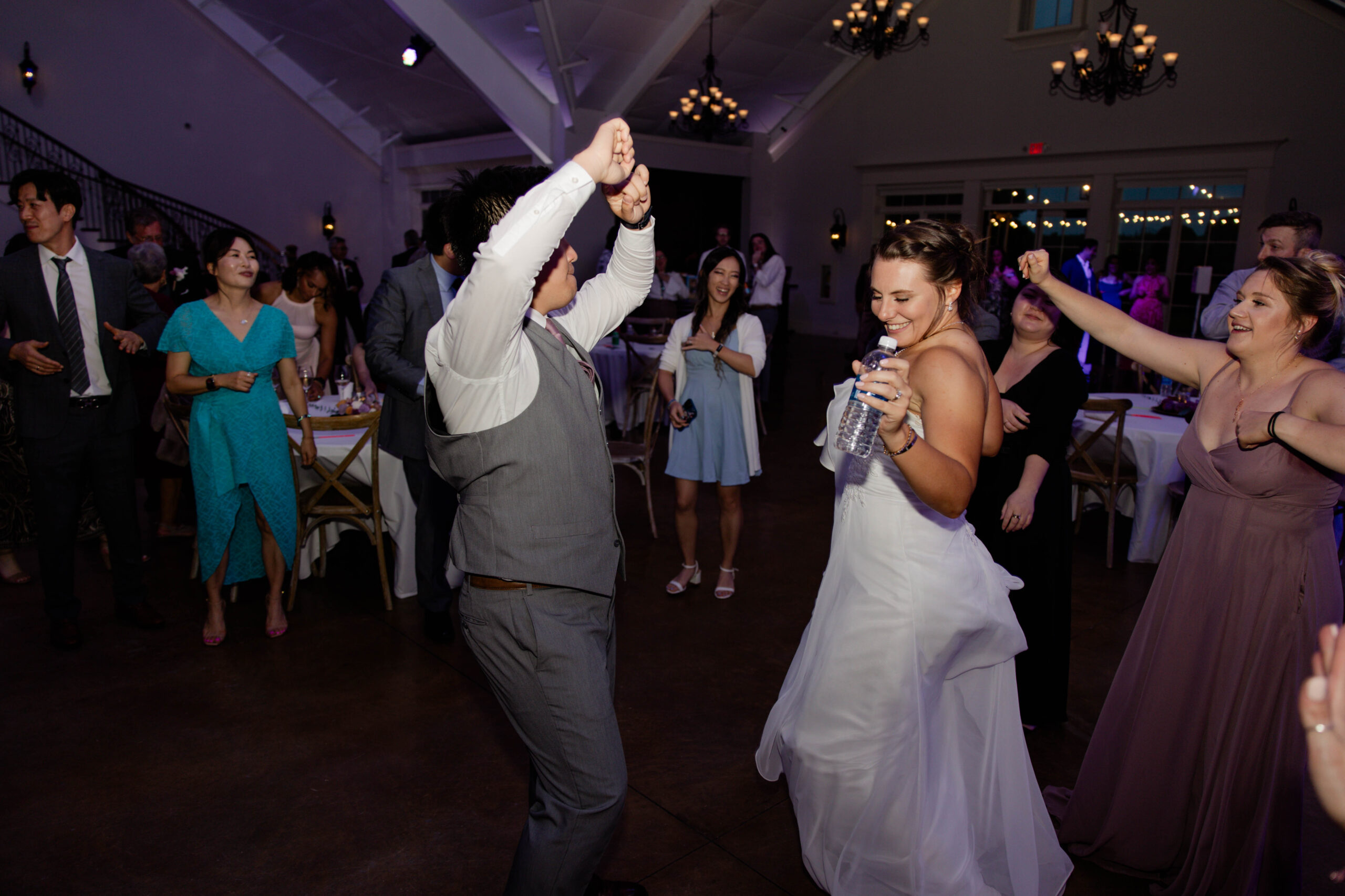 candid photos from the dance floor of a fun wedding reception!