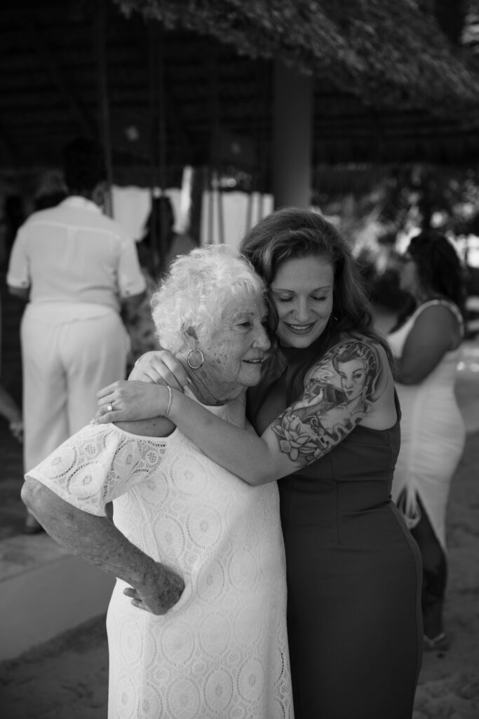 bride shares a moment with her grandma during her destination wedding 