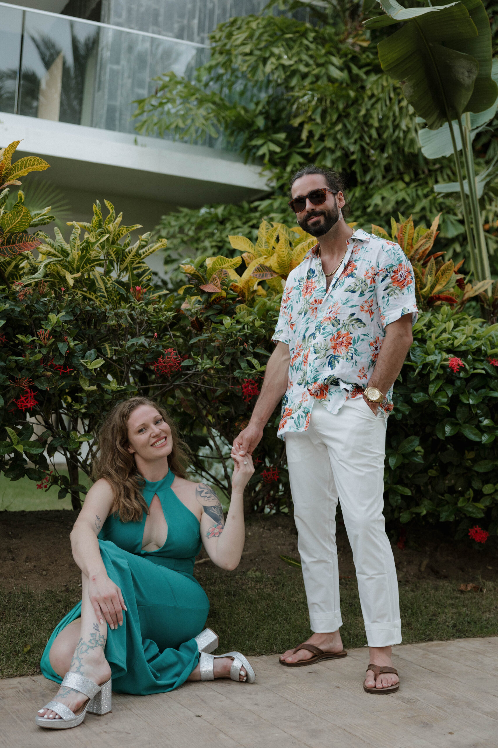 bride and groom pose for a photo together before their rehearsal at dreams onyx punta cana wedding