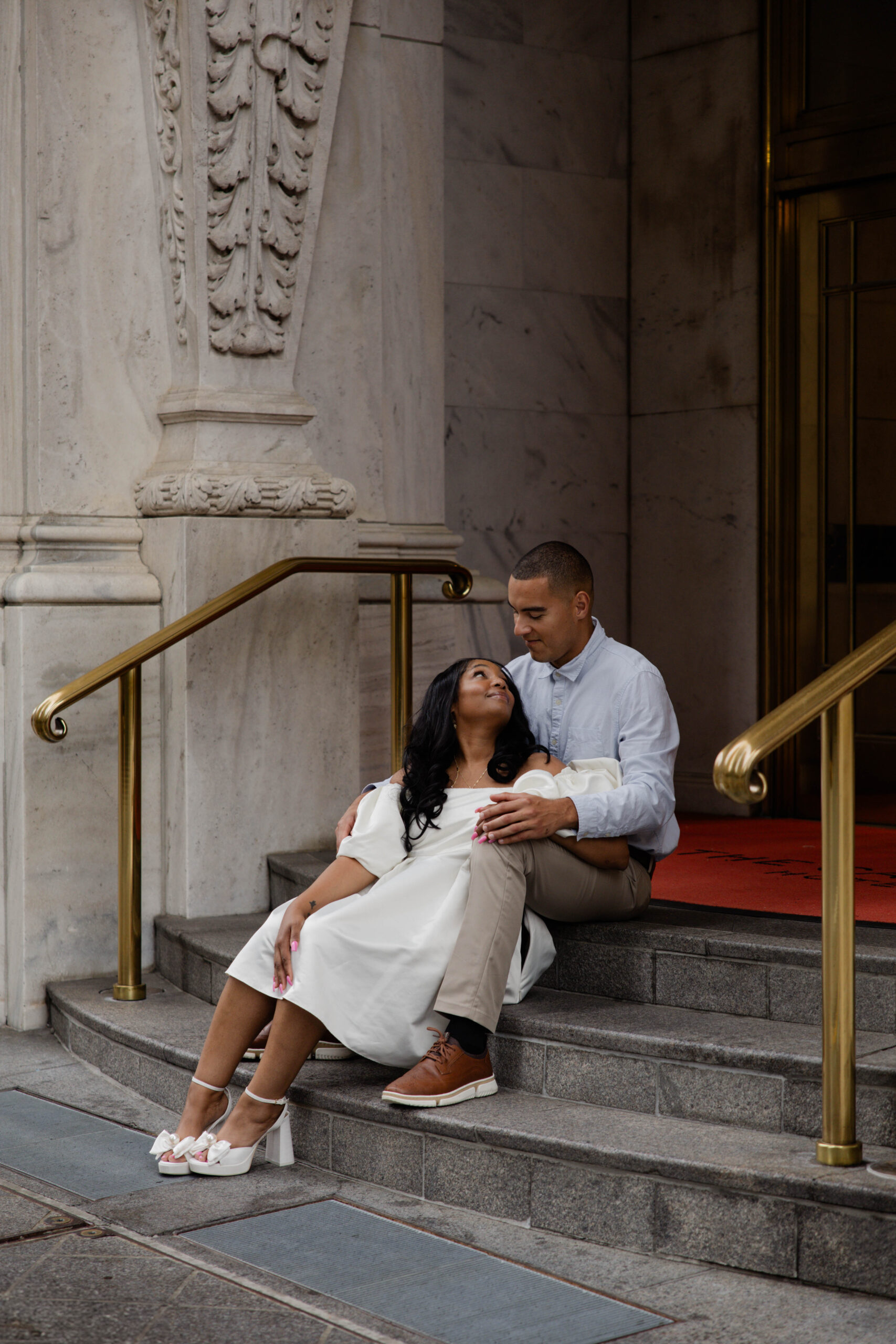 couple laugh and share an inside joke a perfect way to break the stiffness of engagement poses