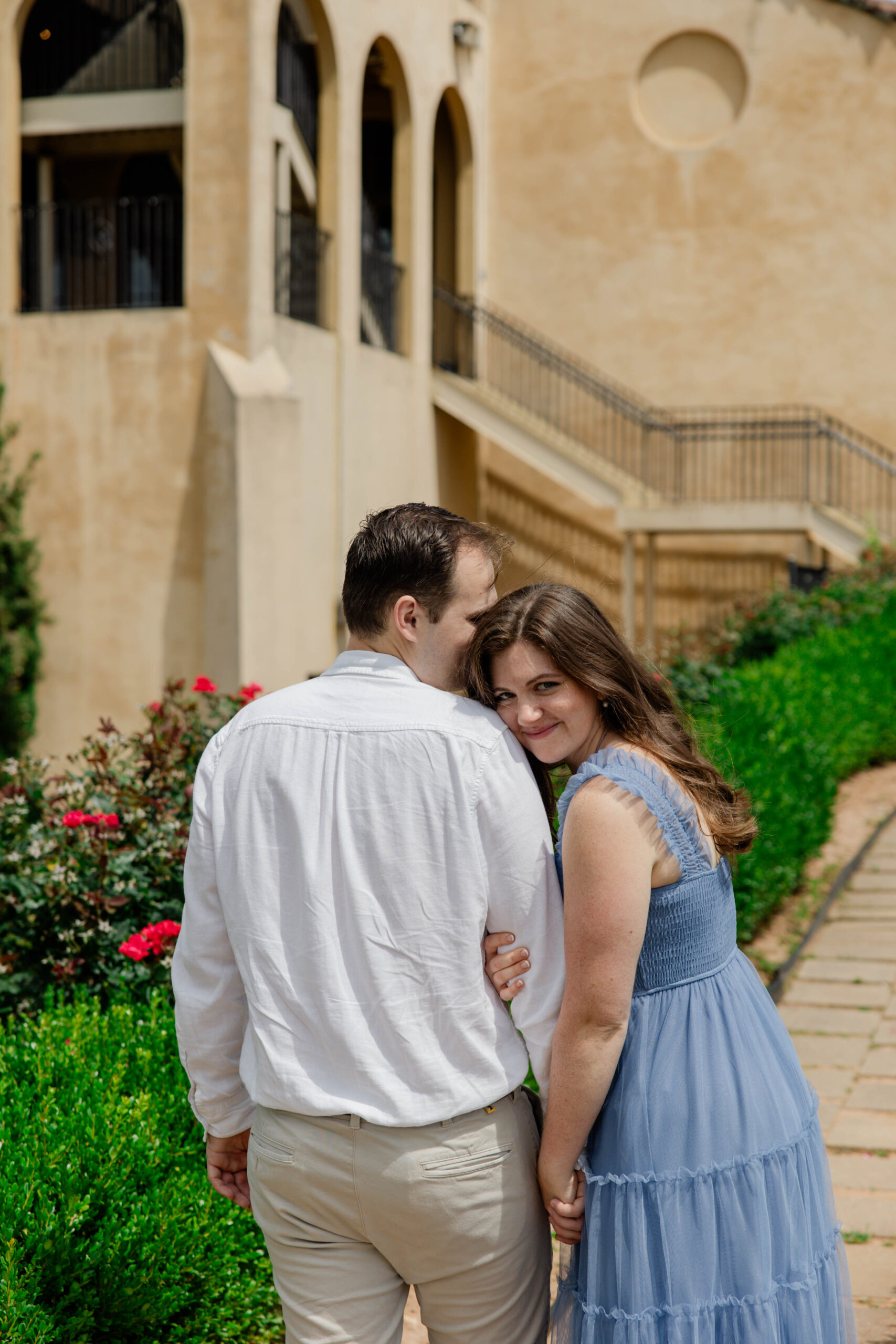 couple walk away from Keri as she captures a photo of the future bride looking back