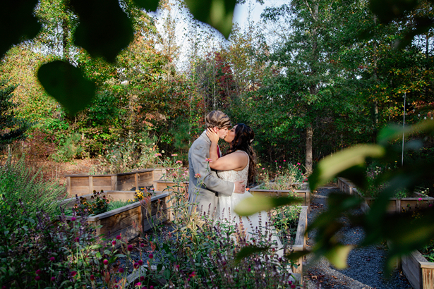 bride and groom share a kiss during their Georgia wedding day