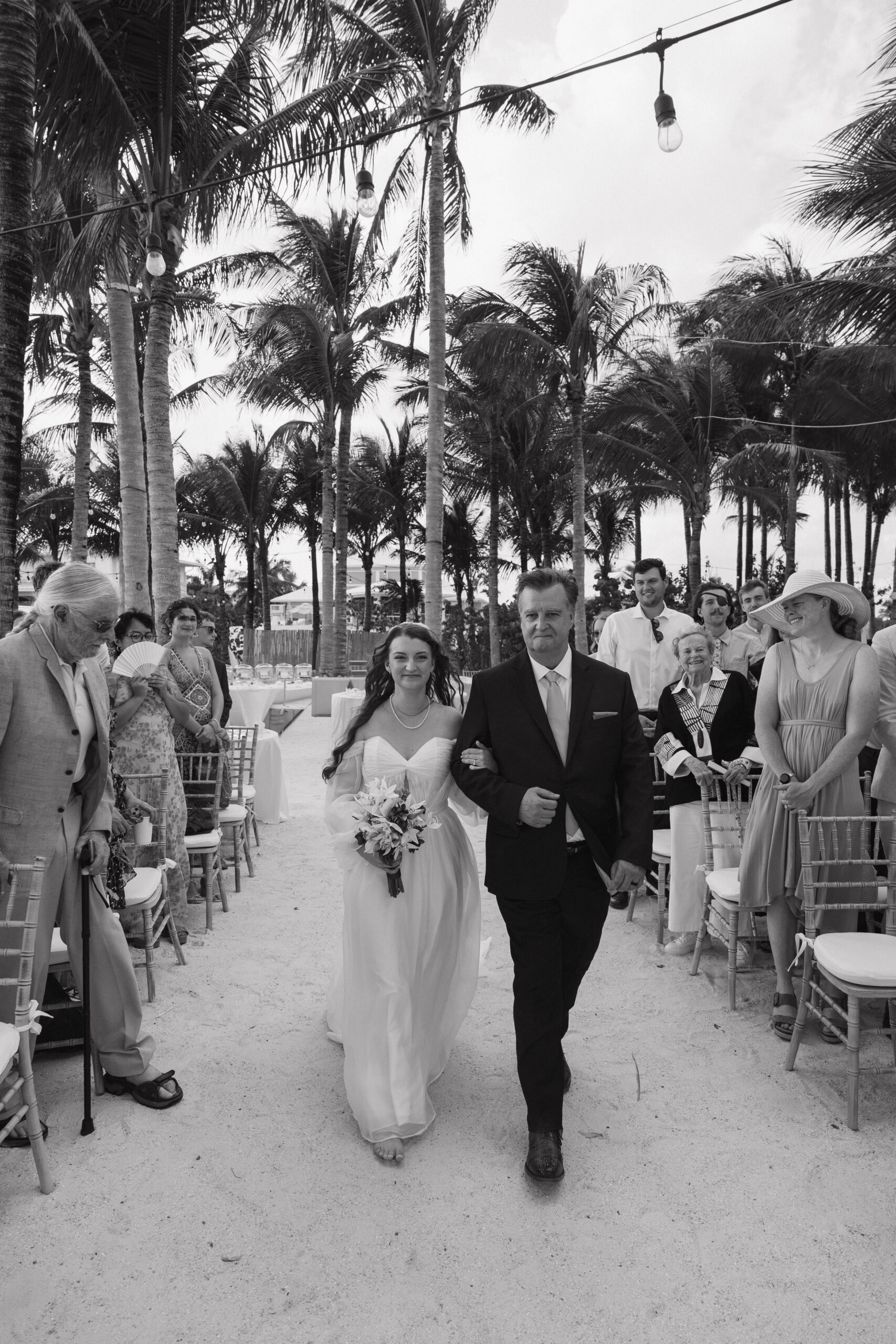 bride enters her stunning wedding at isla bella