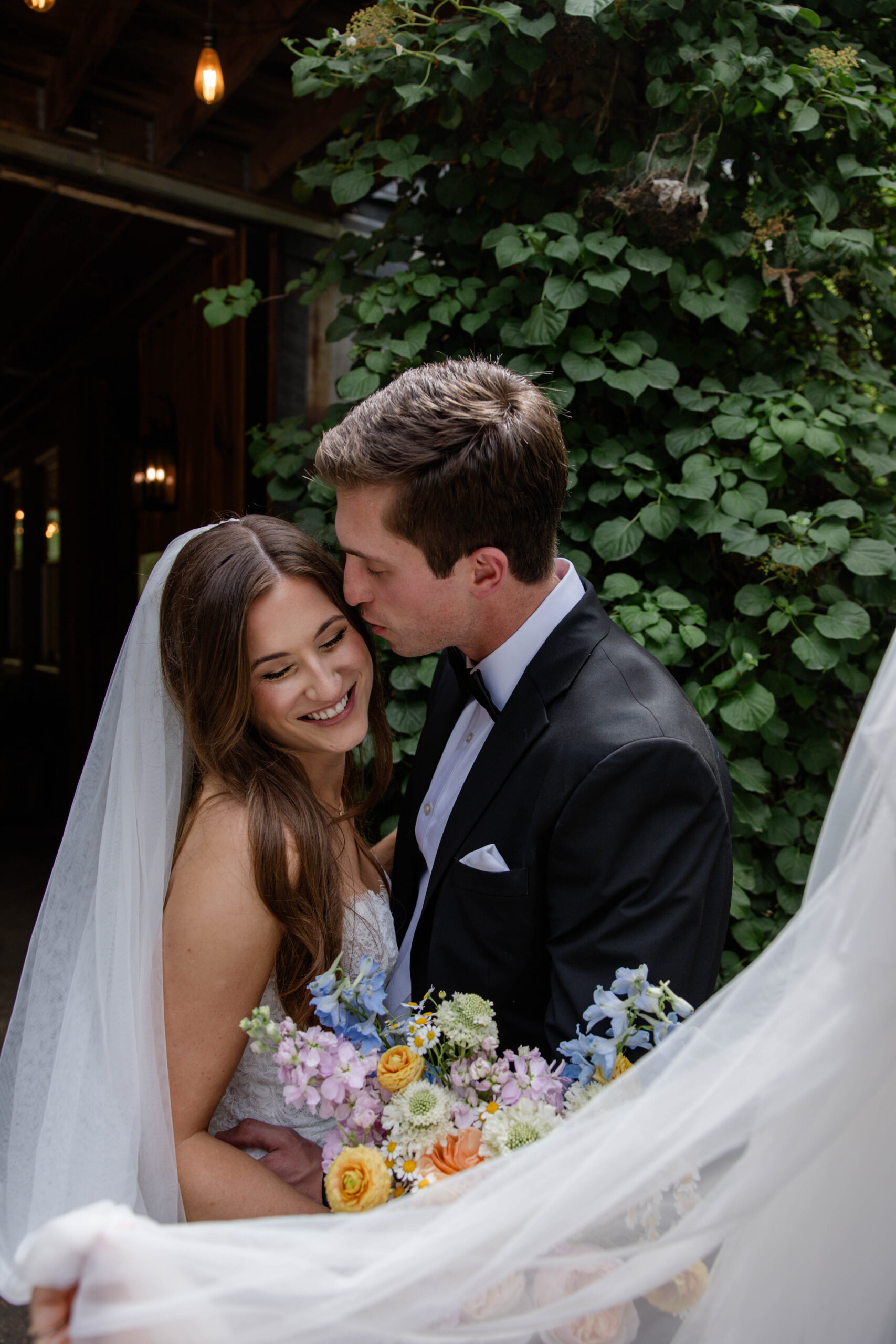 bride and groom share a kiss on their Georgia wedding day at shiloh gardens venue