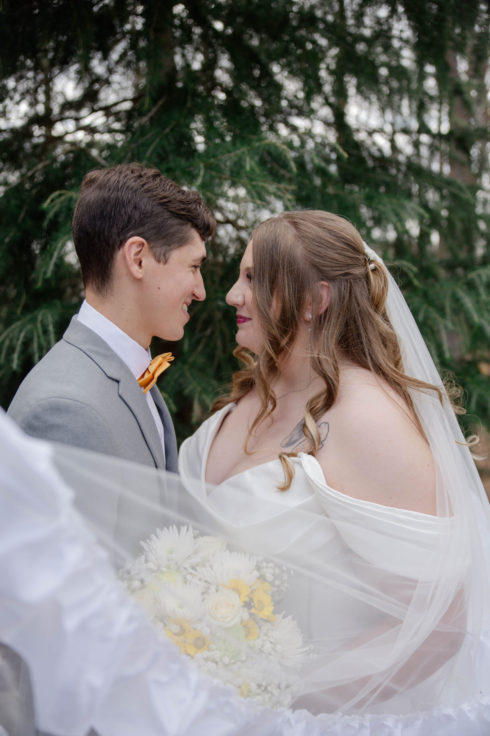 bride and groom share an intimate moment during their bride and groom portrait session