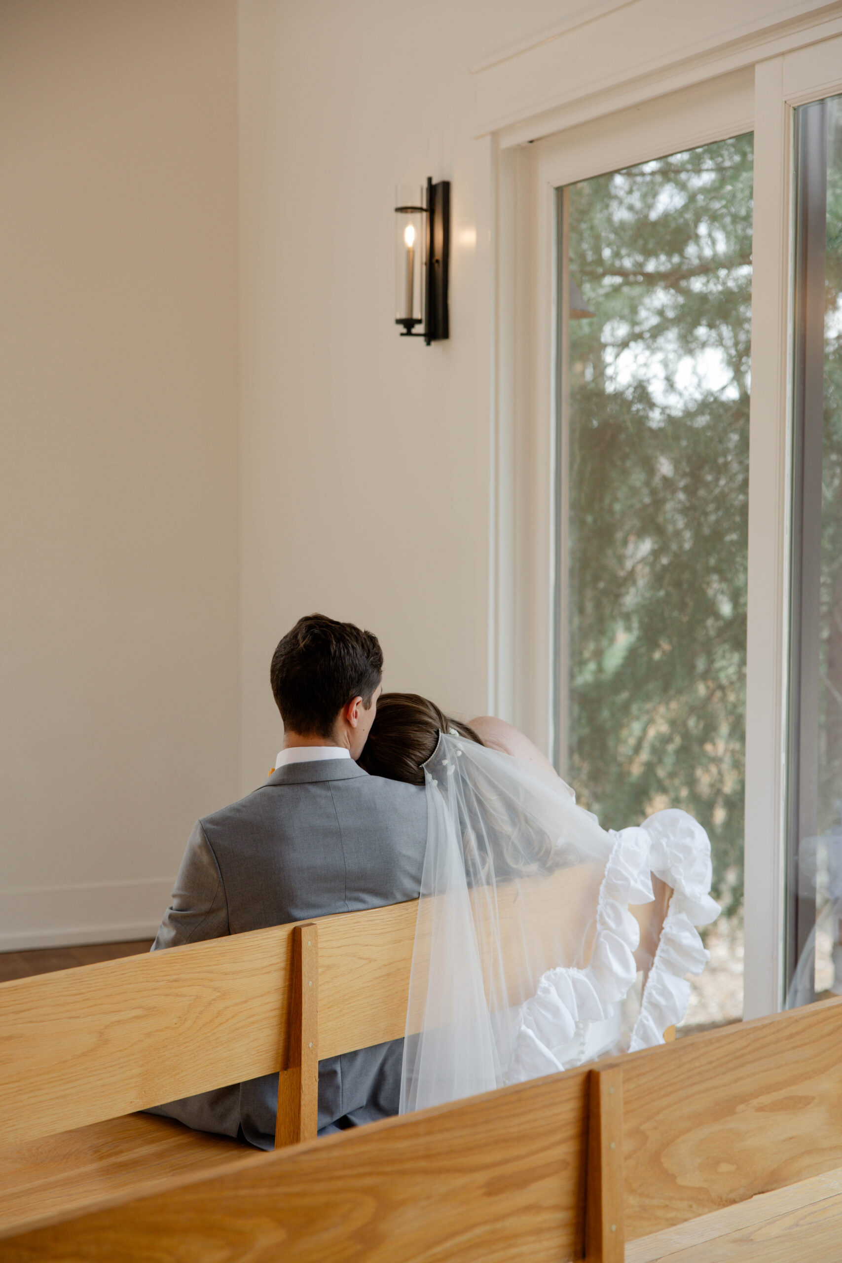 bride and groom share an intimate moment in the juliette chapel on their Georgia wedding day