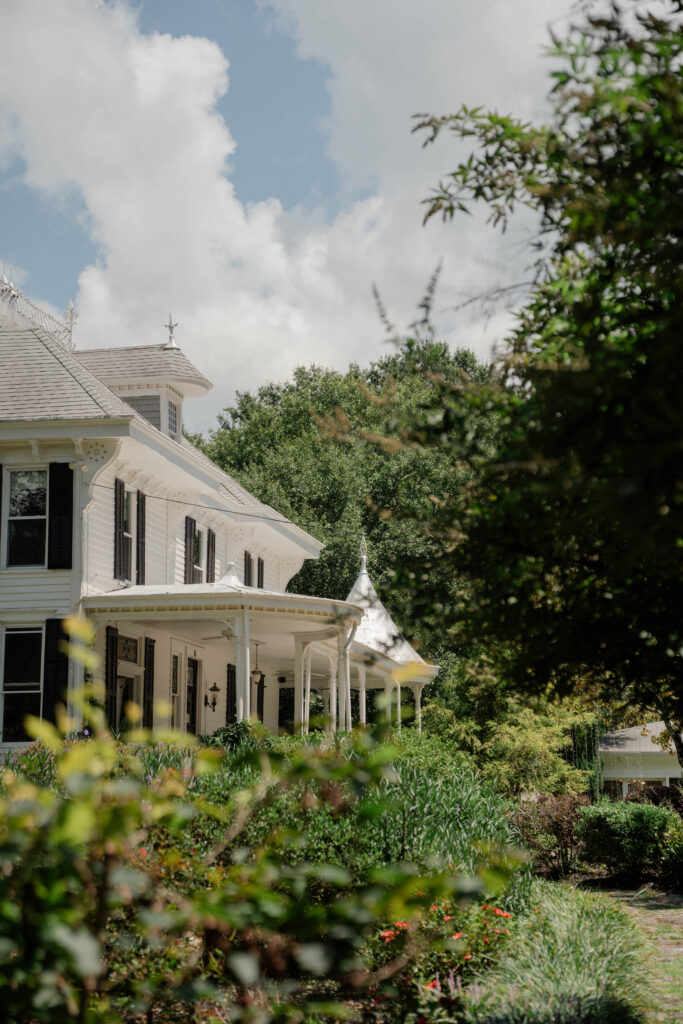 wildflower 301 wedding venue sits with the greenscaping